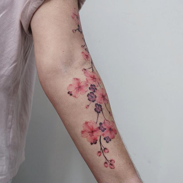 cherry blossom tattoo on arm
