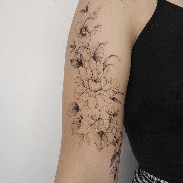 fineline tattoo upper arm