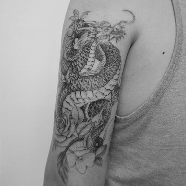 dragon tattoo on arm